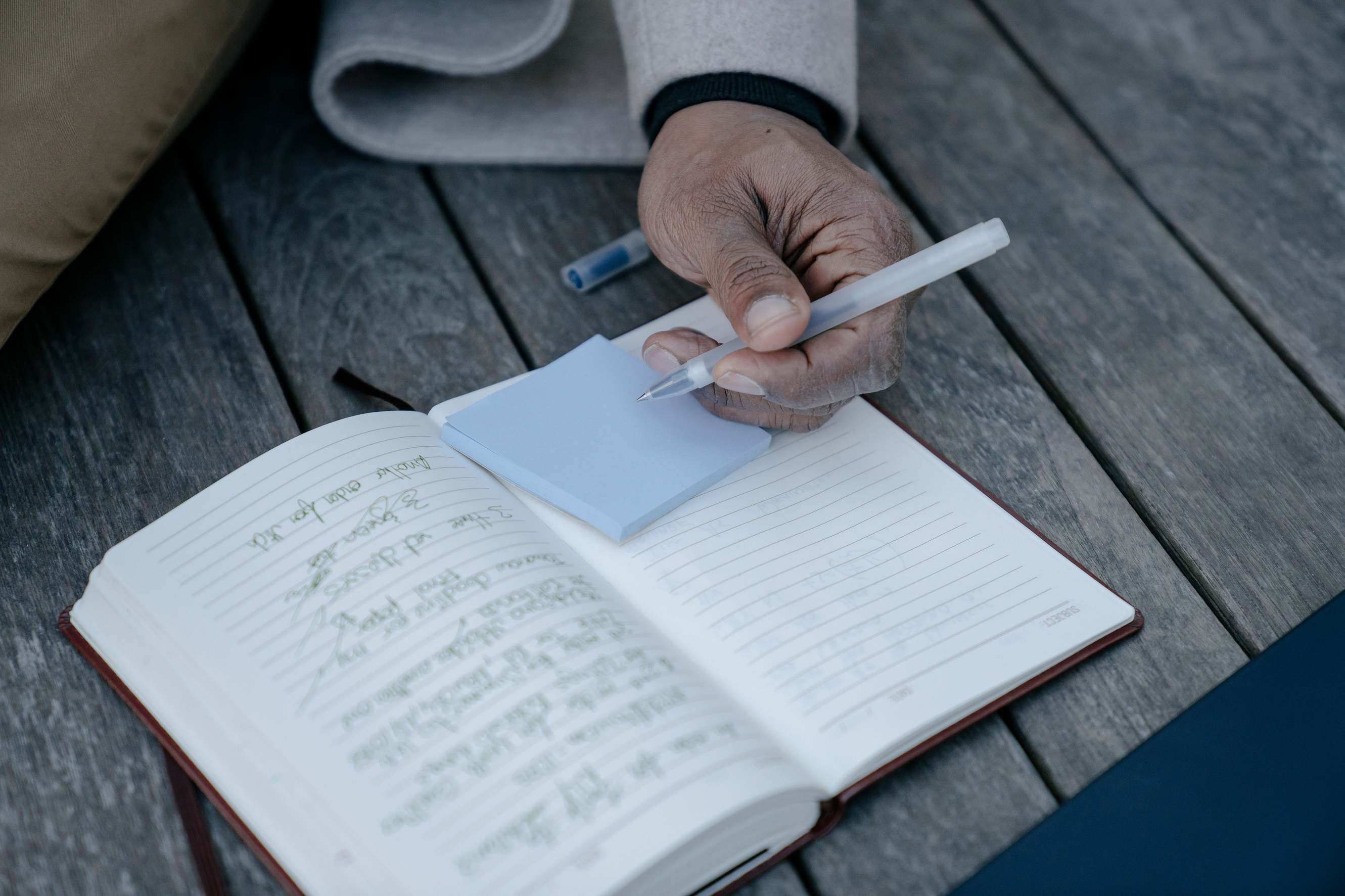 Notebook with pen for record-keeping